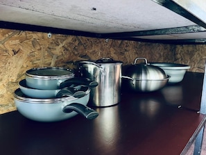 A kitchen with stainless steel cookware, including pots and pans, on a wooden countertop. - California Cabin/Reserved Forest Healing/25min From KL (Bentong)
