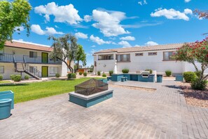 A courtyard with a pool, outdoor seating, and a staircase leading to a building. - 1BR Charming Mesa Stay, Sleeps 2, Near Downtown (Tempe)