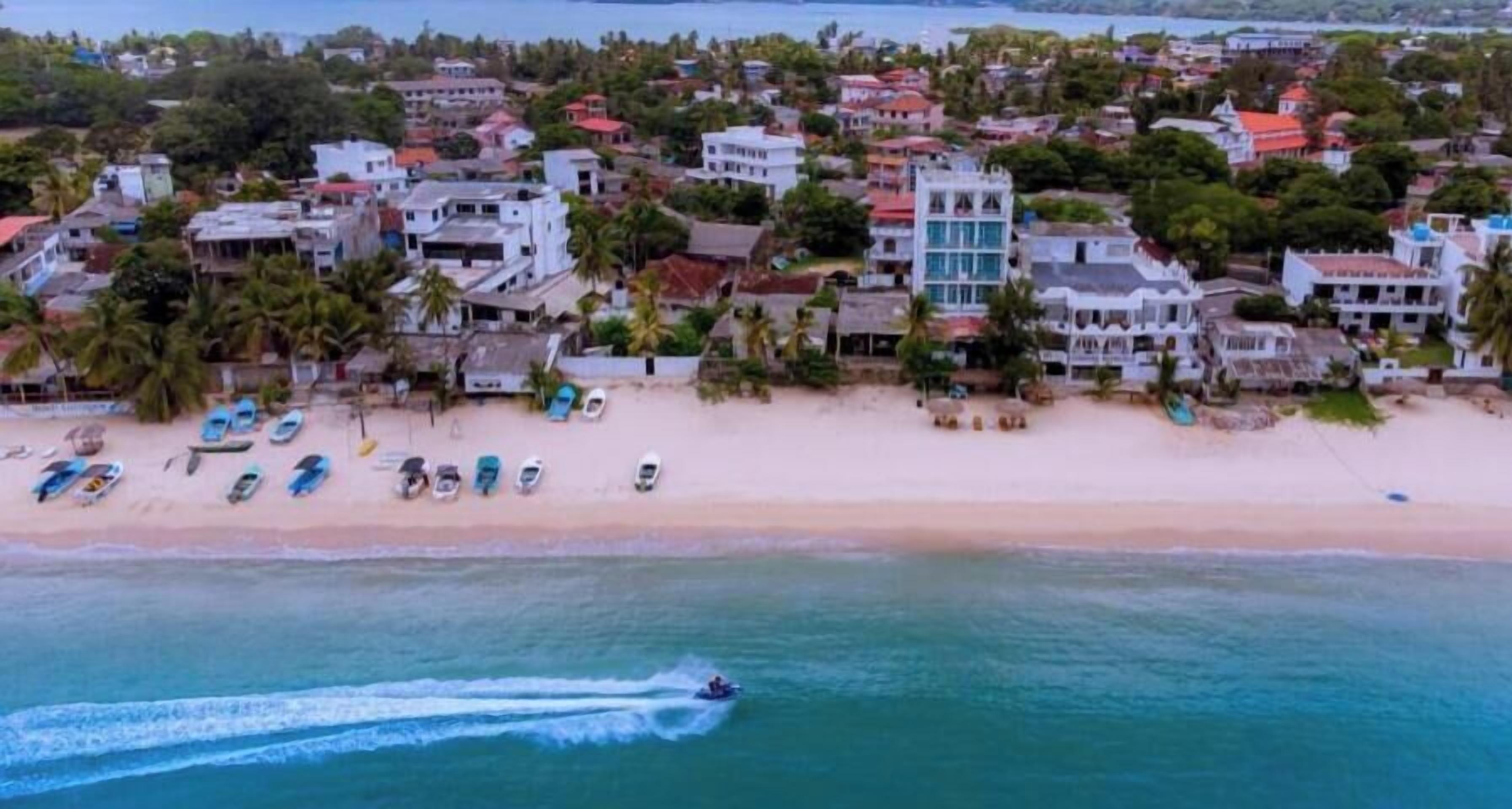 On the beach, white sand