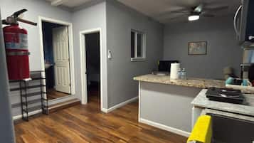Fridge, microwave, stovetop, coffee/tea maker