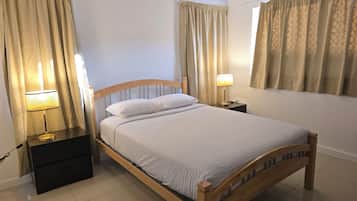 Family Apartment | Blackout drapes, iron/ironing board
