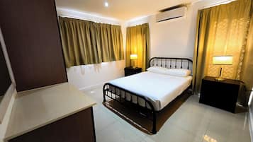 Blackout curtains, iron/ironing board