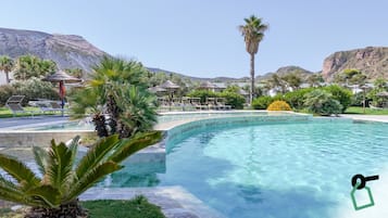 Seasonal outdoor pool, pool umbrellas