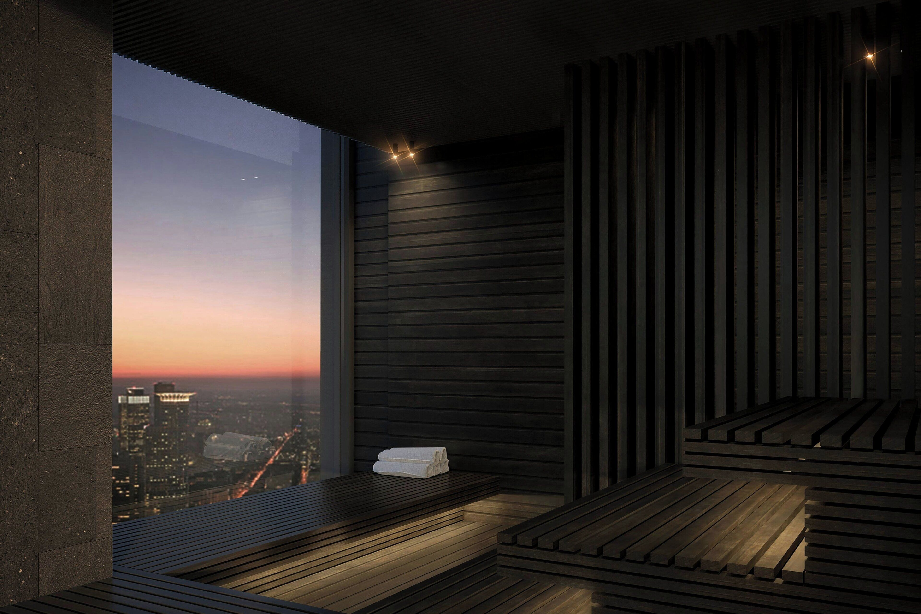 A modern interior with a large window, a bench, and a towel on the windowsill.