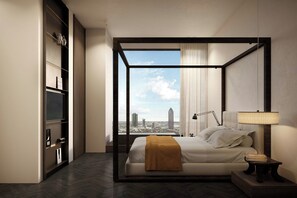 A modern hotel room with a large bed, a nightstand, a lamp, a view of the cityscape, and built-in shelving. - Roomers Parkview, A Luxury Collection Hotel, Frankfurt (Frankfurt)
