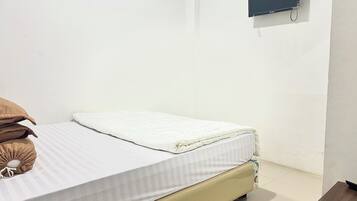 Kamar Single Standar | Wi-Fi gratis dan seprai linen