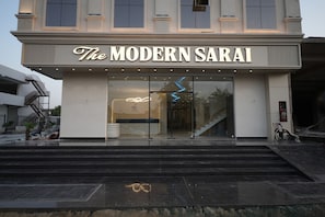 A building with a sign reading 'The Modern Sarai.'
