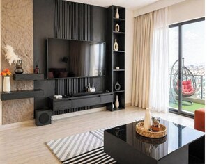 Apartamento Deluxe | Zona de estar