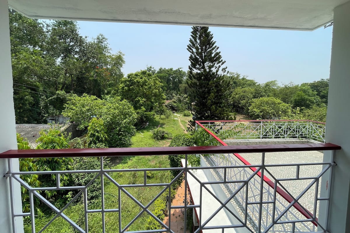 Triple Room, Garden View | Blackout drapes, soundproofing, free WiFi