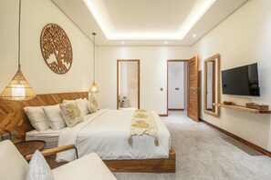 Une chambre à coucher moderne avec un lit en bois, une télévision, un élément décoratif mural et un luminaire au plafond.