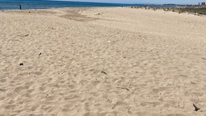 A wide sandy beach with a clear blue sky. - 15 min. drive from Sitges Villa El Ranch 10 min. walk to the beach Jacuzzi 13P (Sitges)