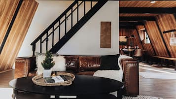 Exclusive Cabin, Mountain View | Living room | 45-inch Smart TV with digital channels, fireplace, books