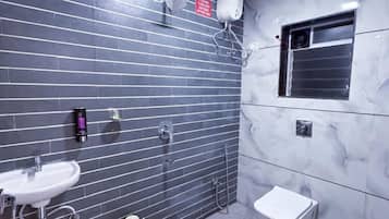 Shower, towels, soap, shampoo
