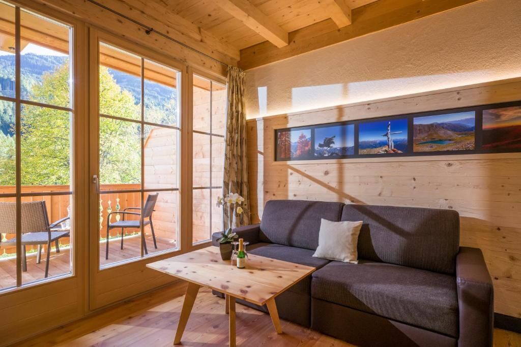 Appartamento familiare, balcone, vista giardino | Area soggiorno