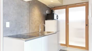 Apartment (801) | Private kitchen | Fridge, microwave, stovetop, cookware/dishes/utensils