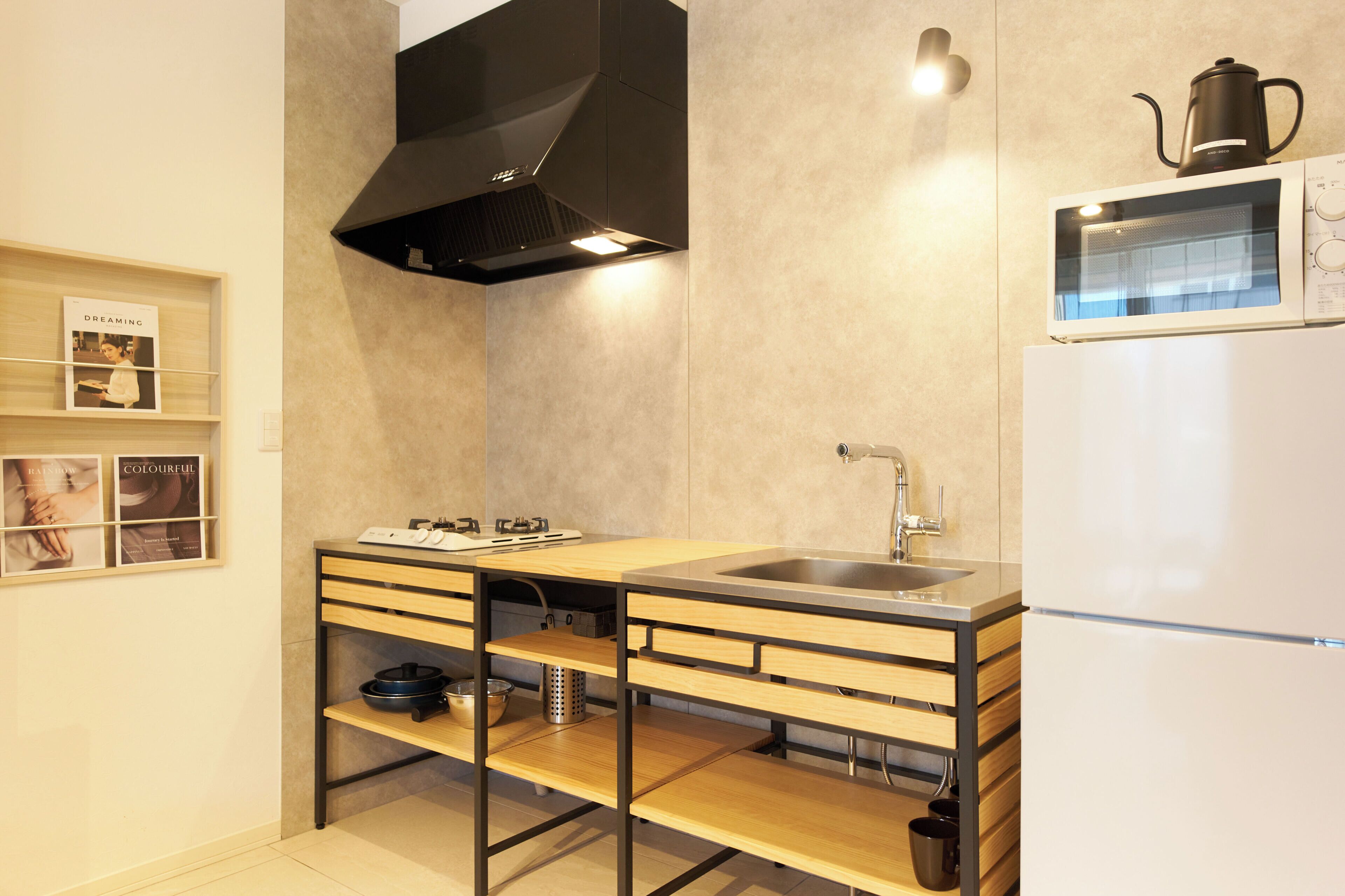 Apartment, Non Smoking (101) | Private kitchen | Fridge, microwave, stovetop, cookware/dishes/utensils