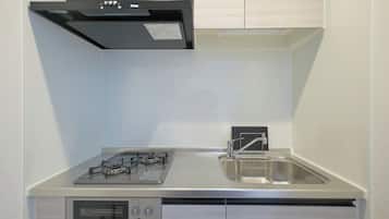 Fridge, microwave, stovetop, cookware/dishes/utensils