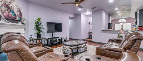 TV, fireplace, books