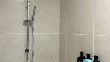Shower, free toiletries, towels, soap