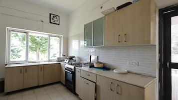 Quarto casal superior, vista para o jardim | Cozinha privada