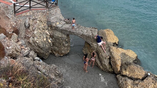 A coastal beach with rocky formations, a wooden walkway, and a clear view of the sea. - Apartment Sleeps 7 With Balcony (Velez-Malaga)