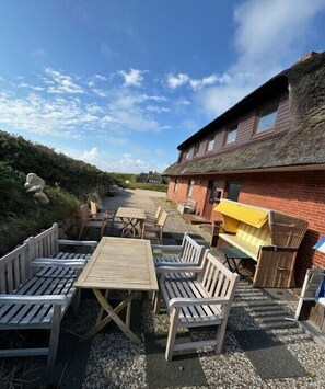 Outdoor dining - Holiday apartment with 1 bedroom (Sylt\/ OT Rantum)