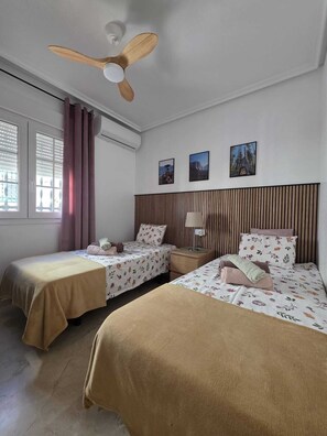 2 dormitorios, tabla de planchar con plancha, wifi y ropa de cama