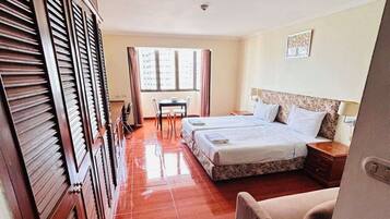 Deluxe Studio, Pool View | In-room safe, laptop workspace, iron/ironing board, free WiFi