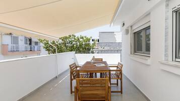 Family Apartment, 3 Bedrooms, Balcony | Outdoor dining
