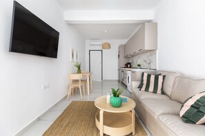 Apartamento conforto, 1 quarto, sacada | Área de estar