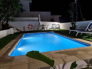 A swimming pool with lounge chairs and a lifebuoy. - Family villa Green House - Private pool - Garden - Tenerife North Bajamar (Bajamar)