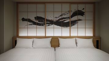A double bed with a headboard featuring a traditional Japanese sliding door with a black abstract design.