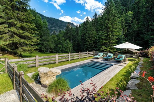 Secluded luxury farmhouse overlooking Aiguille du Midi. 6 hectares, heated pool