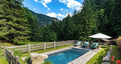 Secluded luxury farmhouse overlooking Aiguille du Midi. 6 hectares, heated pool