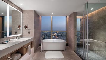 Executive Suite, Private Bathroom | Bathroom | Hair dryer, slippers, towels, soap
