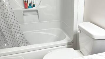Hair dryer, towels, soap, shampoo