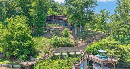 Lakefront retreat with private dock, lake views, spacious decks, pool table, and sun room!