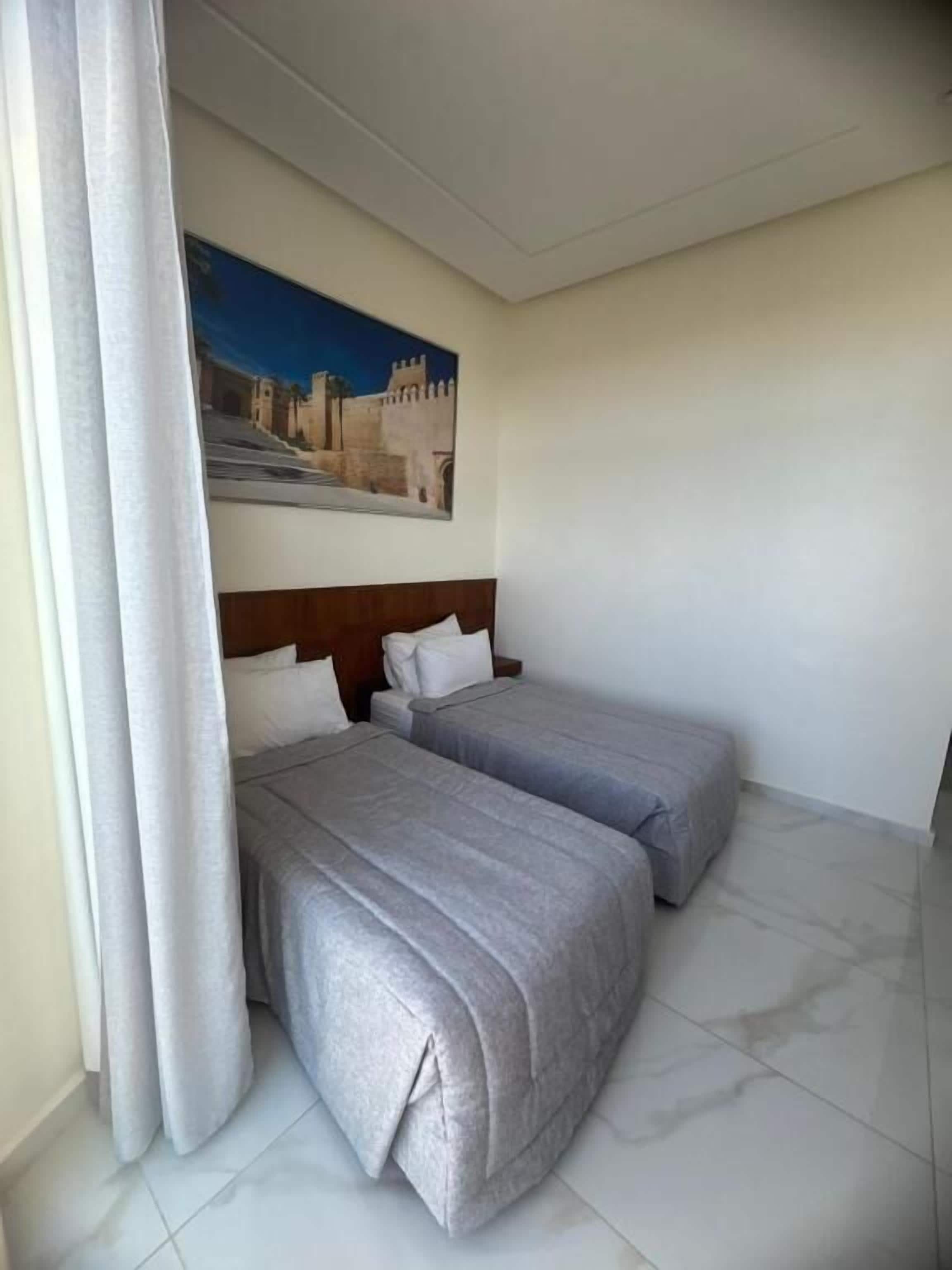 Chambre Confort avec lits jumeaux, balcon, vue ville | Wi-Fi gratuit