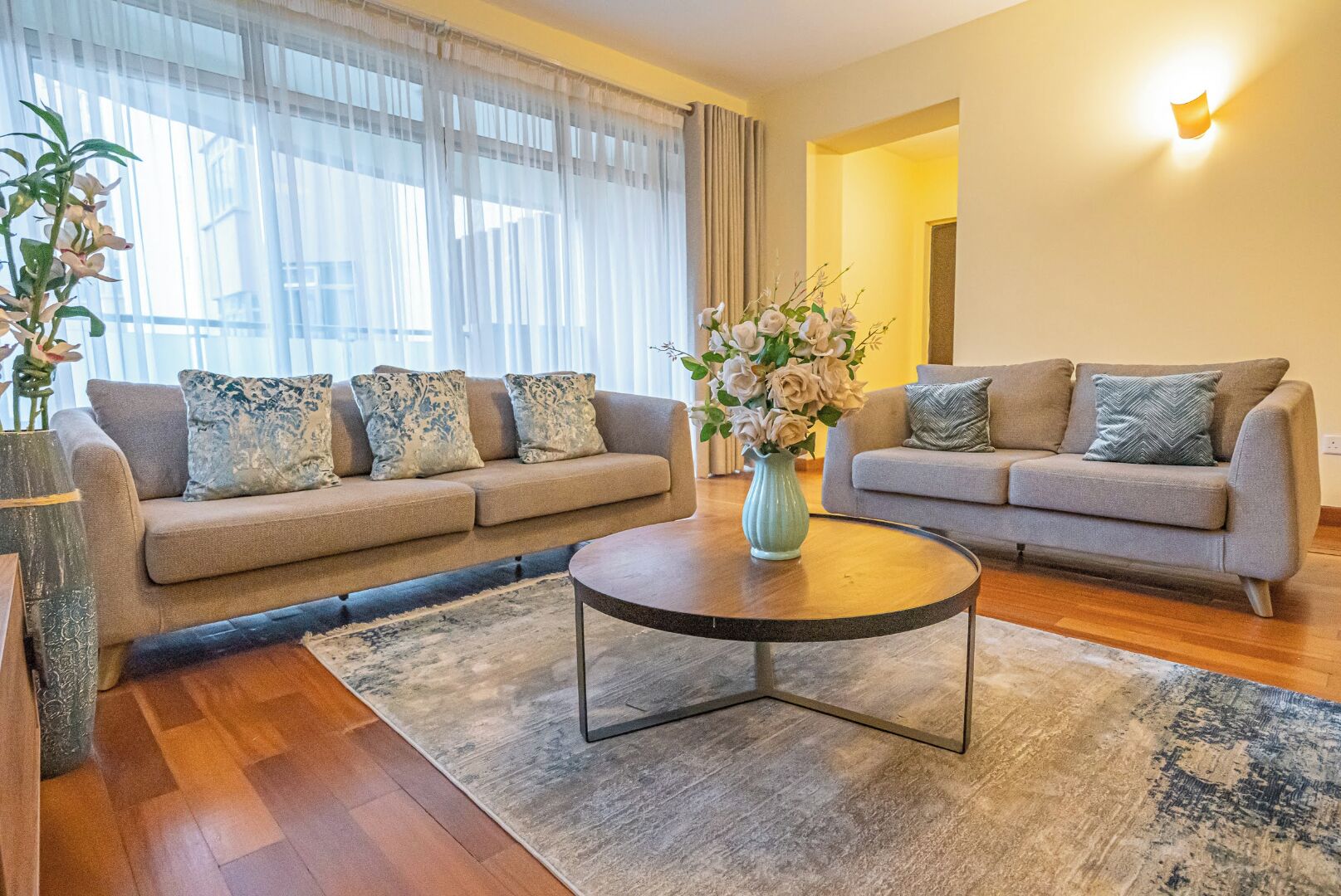 Deluxe Apartment | Living area | 42-inch flat-screen TV with digital channels