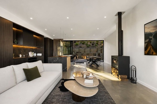 Sink into your plush sofa while the fireplace crackles, then step outside to your private dining terrace
