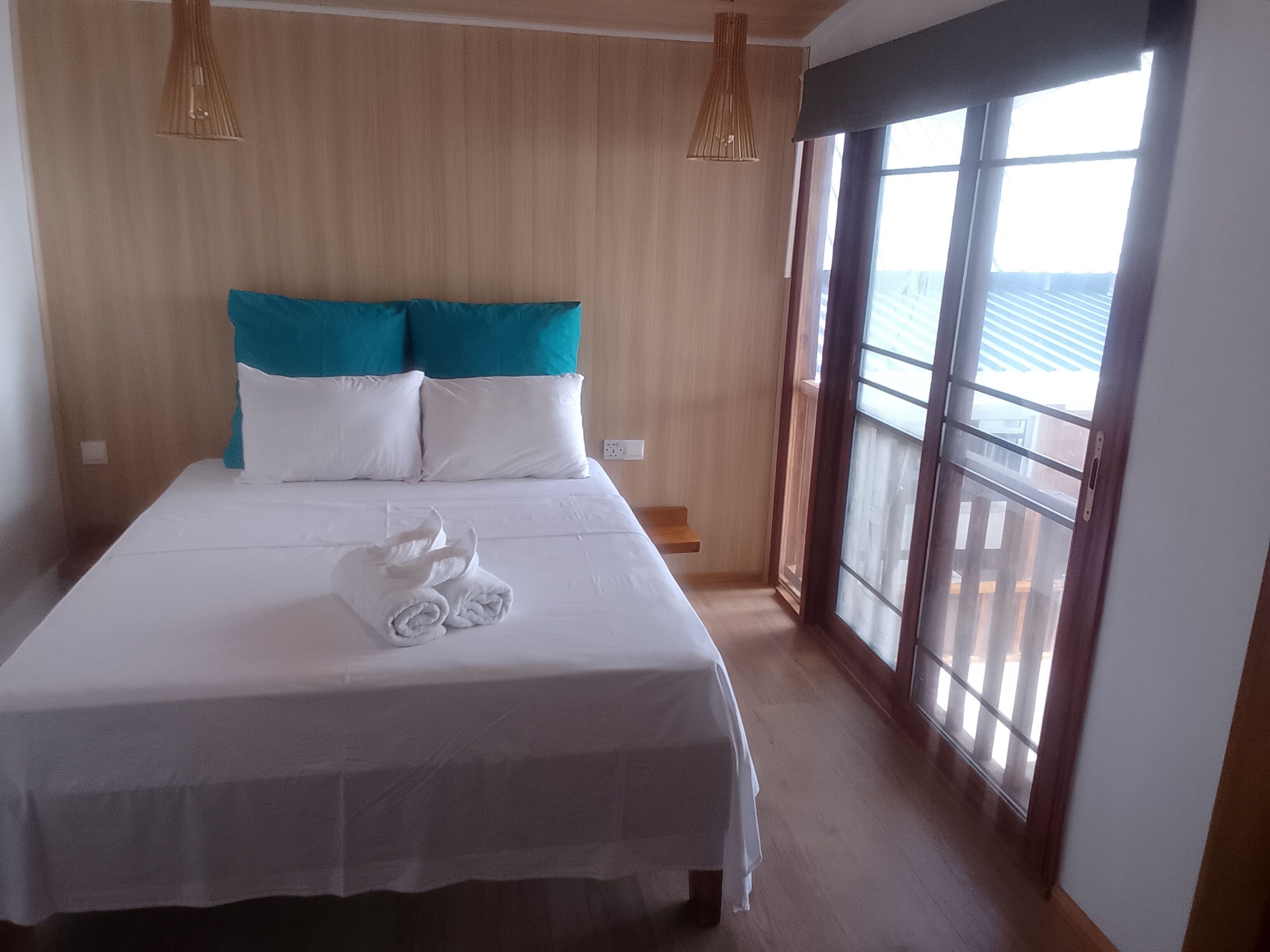 Deluxe Quadruple Room, Balcony, Sea View | In-room safe, iron/ironing board, free WiFi