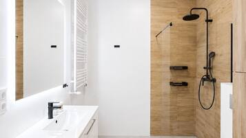 Superior Apartment, Balcony, Courtyard View | Bathroom | Shower, hair dryer, towels, soap