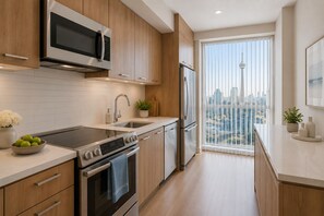 Economy Room, City View | Private kitchen