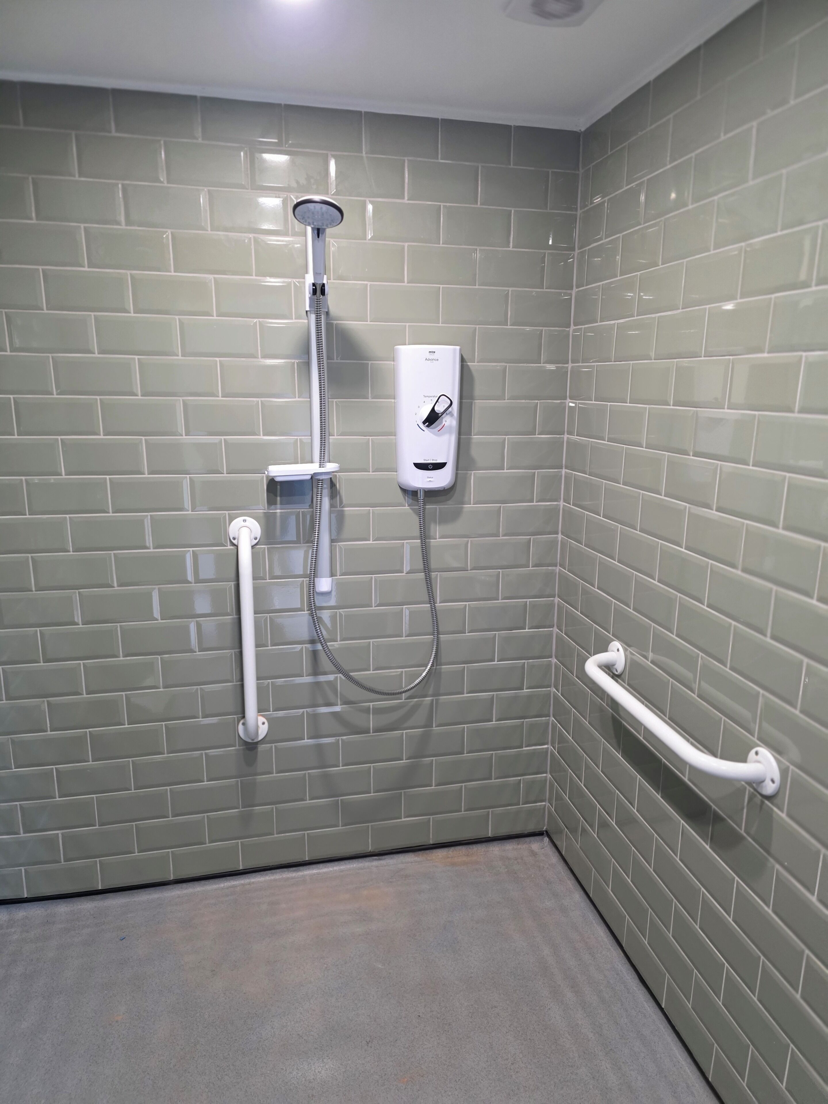Shower, towels, soap, toilet paper
