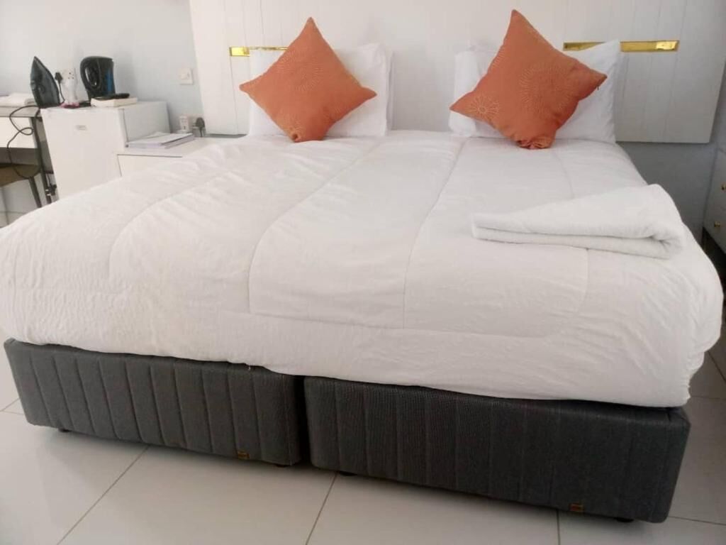Kamar Double atau Twin Deluks, balkon | Tirai kedap cahaya, setrika/meja setrika, dan Wi-Fi gratis