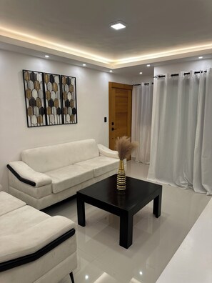 Living area - Cozy yet modern apartment in a very peaceful residential area in Santiago. (Santiago de los Caballeros)