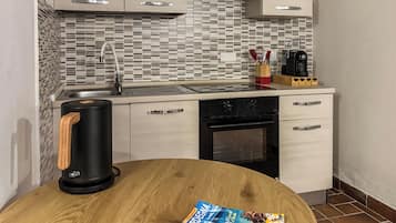 Appartement, patio | Cuisine privée