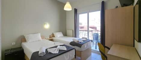 Chambre Triple, balcon, vue mer | Wi-Fi gratuit