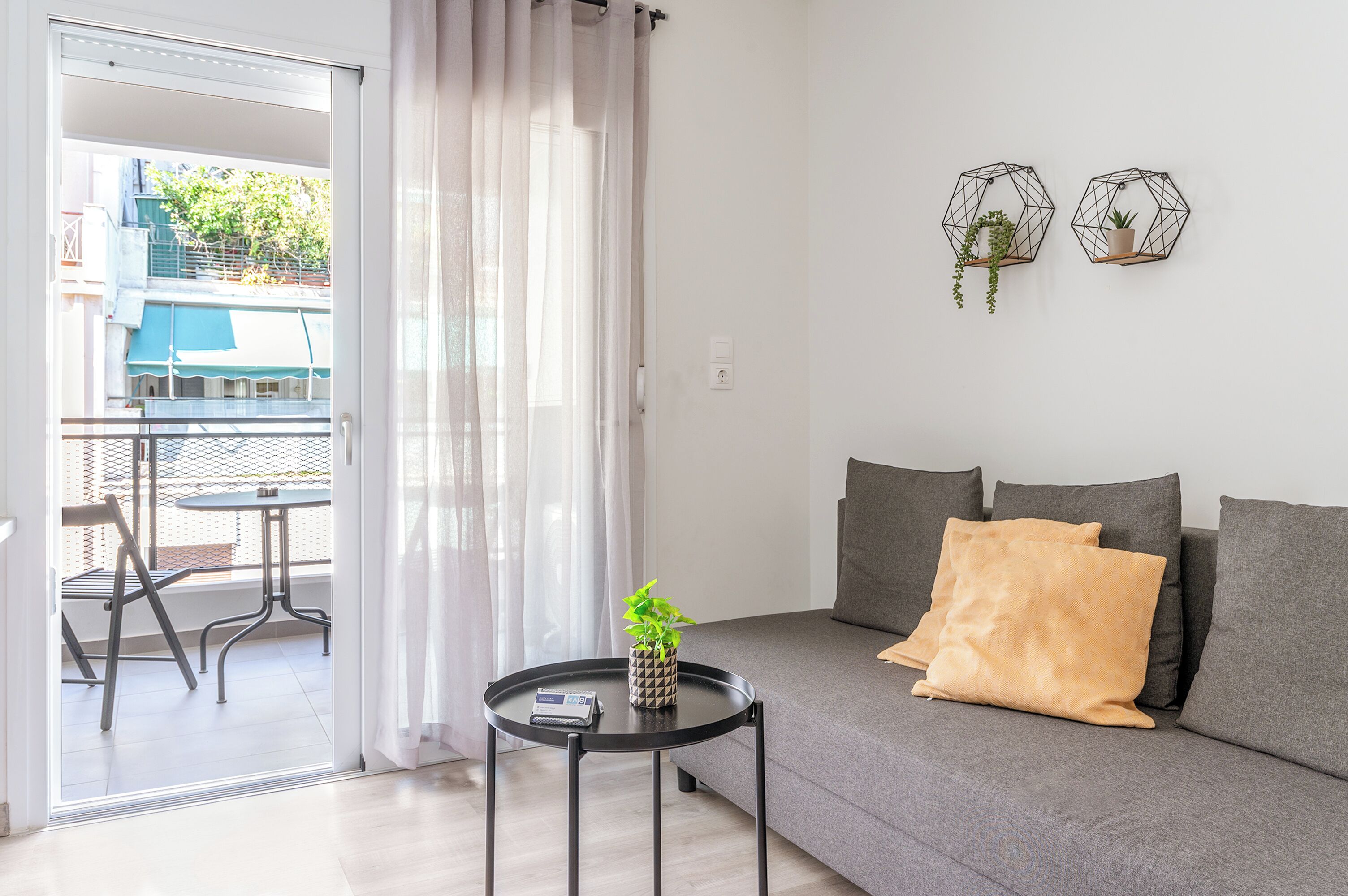 Estudio Confort, vista a la ciudad | Área de sala de estar