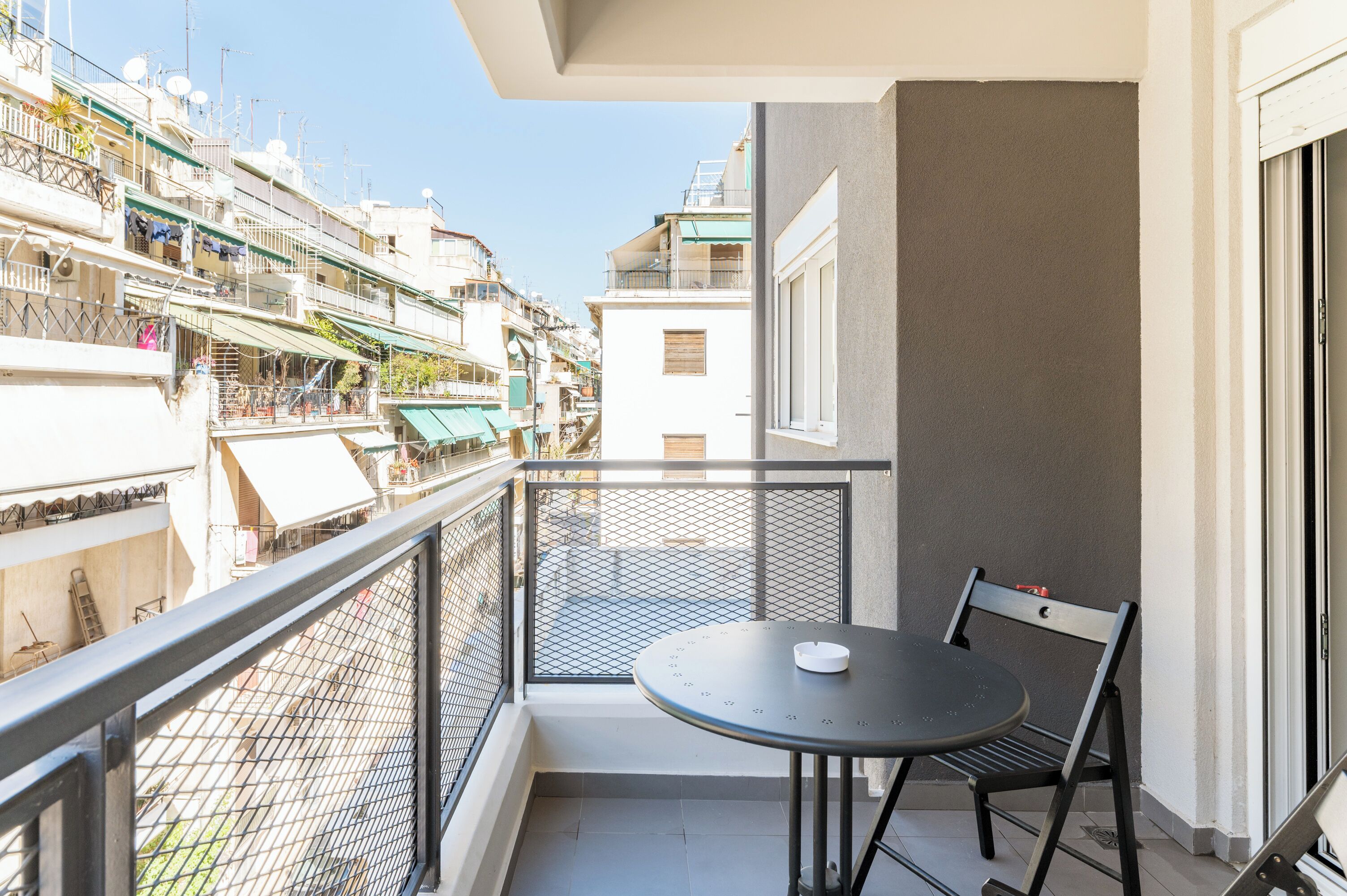 Departamento Confort, vista a la ciudad | Restaurante al aire libre